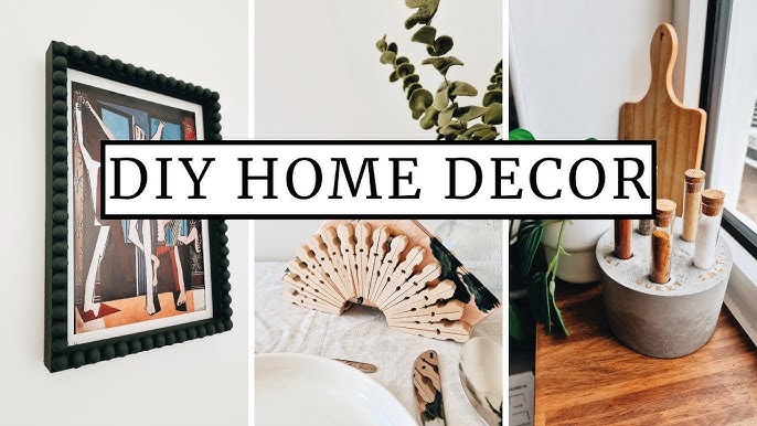 Modern wall decoration ideas featuring framed abstract art, macrame hanging, woven rattan decor, and indoor plants styled with a wooden console table in a cozy living space.